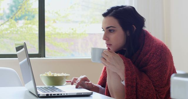 Woman Wrapped in Blanket Working on Laptop at Home - Download Free Stock Images Pikwizard.com