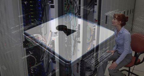 Technician Overseeing Secure Data Processing on Server