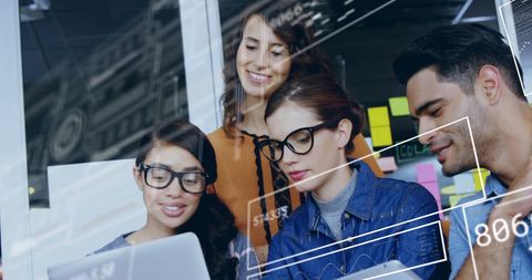 Diverse Coworkers Collaborating on Business Technology