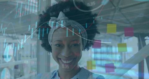 African Businesswoman Smiling Amid Financial Data Hologram