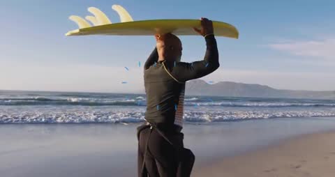 Surfer Carrying Surfboard on Beach Adventure Ocean Waves