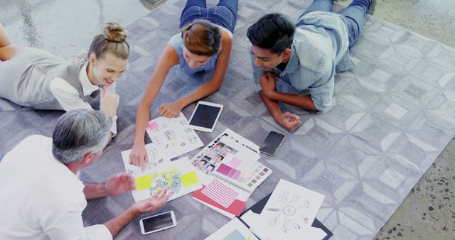 Creative Team Brainstorming Project Ideas on Floor Together - Download Free Stock Images Pikwizard.com