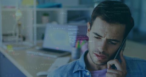 Focused Professional Holding Smartphone in Modern Home Office