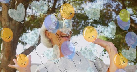 Senior Woman Smiling with Playful Balloon Overlay in Nature