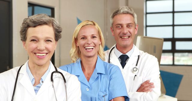 Smiling Medical Team in Hospital Setting - Download Free Stock Images Pikwizard.com