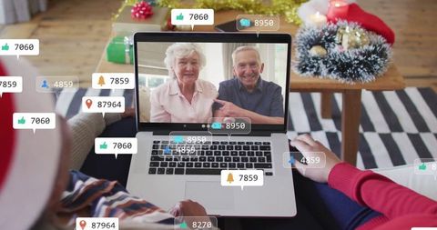 Family Celebrating Christmas Through Video Call with Reactions