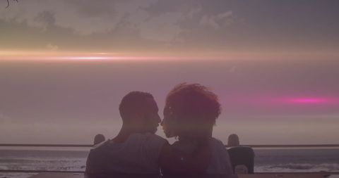 Couple on Beach Embracing at Sunset with Lens Flare - Download Free Stock Images Pikwizard.com