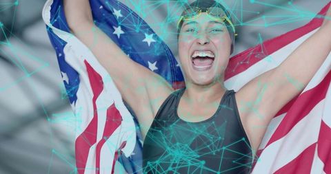 Cheering swimmer celebrates victory with american flag