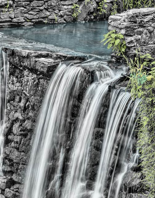 Peaceful Waterfall Flowing Over Rocks - Download Free Stock Photos Pikwizard.com