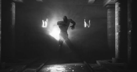 Eerie Zombie Mummy in Dark Crypt with Burning Torches - Download Free Stock Images Pikwizard.com