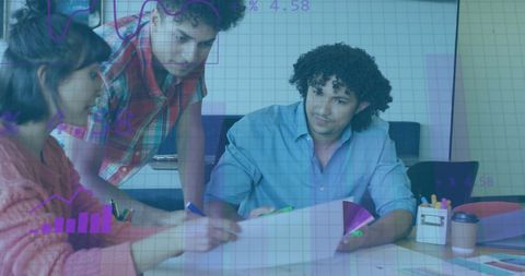 Diverse Colleagues Analyzing Data with Digital Diagrams in Office - Download Free Stock Images Pikwizard.com