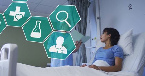 Patient Consultation with Digital Medical Interface in Hospital Room