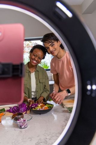 Creating Vibrant Salad on Kitchen Counter Using Ring Light and Smartphone for Creators