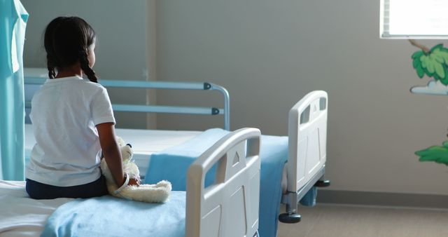 Lonely Child Holding Teddy Bear in Hospital Ward - Download Free Stock Images Pikwizard.com