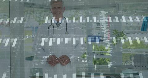Senior physician reviewing medical data dashboard with digital analytics overlay