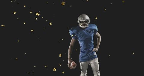 Cinematic football player posing with helmet and ball against bold starry cosmic backdrop