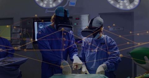 Surgeons wearing virtual reality headsets performing high-tech augmented reality surgery