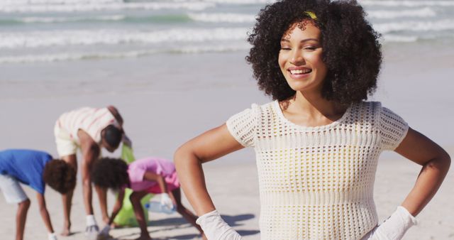 Happy African American Woman Volunteering at Beach Cleanup - Download Free Stock Images Pikwizard.com