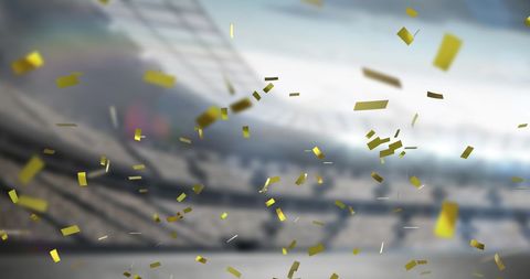 Golden confetti falling over stadium celebrating victory