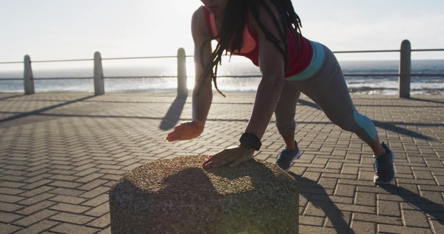 Young Woman Exercising Outdoors at Waterfront Promenade - Download Free Stock Images Pikwizard.com