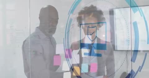 Colleagues Collaborating with Innovative Digital Security Interface in Modern Office