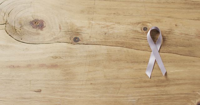 Image of white lung cancer ribbon on wooden background - Download Free Stock Photos Pikwizard.com