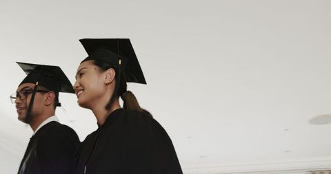 Happy graduating students celebrating academic success