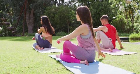 group practicing yoga outdoors in sunny park - Download Free Stock Images Pikwizard.com