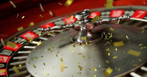Roulette Wheel with Falling Confetti in Casino Atmosphere - Download Free Stock Images Pikwizard.com
