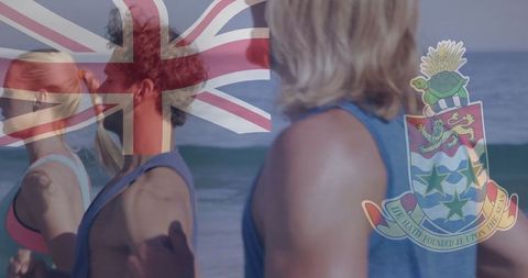 Running Group on Beach by Water in Tank Tops and Shorts