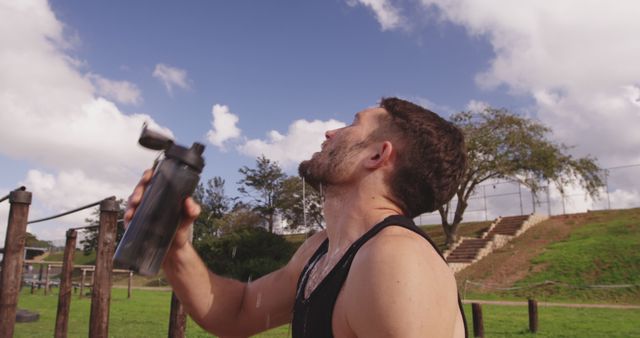 Athlete Rehydrating After Outdoor Workout - Download Free Stock Images Pikwizard.com