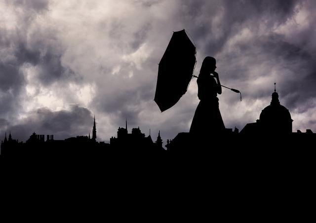Silhouette of woman holding umbrella walking against dramatic stormy sky with dark clouds. Captures the essence of a rainy, overcast urban environment with high contrast between figure and background. Perfect for use in themes related to weather, solitude, drama, urban life, and resilience.