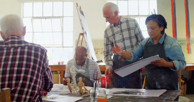 Senior Adults Engaging in Art Class Workshop Painting and Drawing - Download Free Stock Images Pikwizard.com