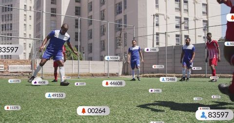 Dribbling football player controlling ball on urban turf with floating social notifications