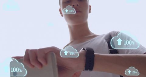Young Man Using Smartphone with Cloud Data Interfaces