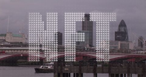 Nft concept over london cityscape with digital graphics