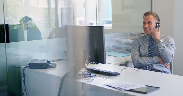 Customer Support Representative Using Headset and Computer in Modern Office - Download Free Stock Images Pikwizard.com