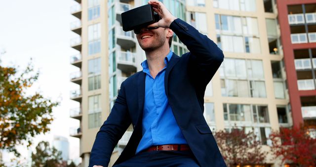 Businessman Experiencing Virtual Reality Outdoors - Download Free Stock Images Pikwizard.com