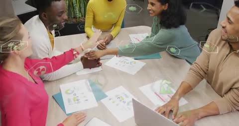 Diverse Team Celebrating Successful Collaboration with Cheerful Handstacking