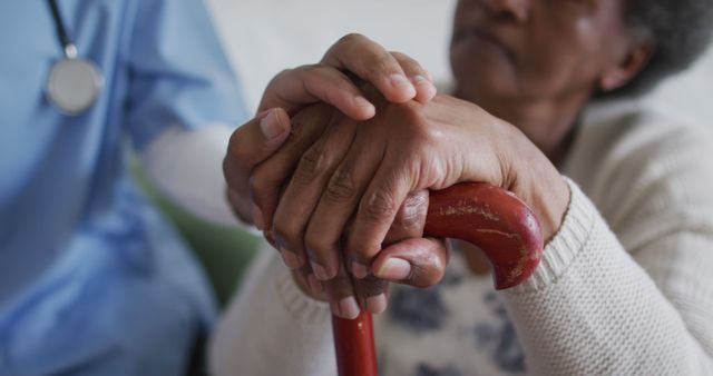 Elderly Woman Receiving Emotional Support from Caregiver - Download Free Stock Images Pikwizard.com