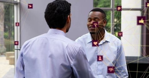 Businessmen Engaging in Digital Network Communication