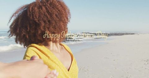 Joyful Beach Walk Holding Hands with Independence Day Spirit