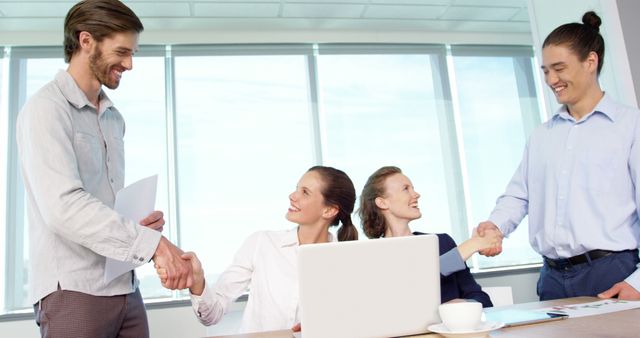 Business Team Shaking Hands During Successful Meeting - Download Free Stock Images Pikwizard.com