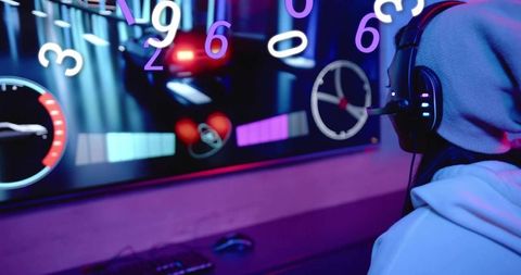 Woman gamer playing neon racing simulator at desk with headset and hud display