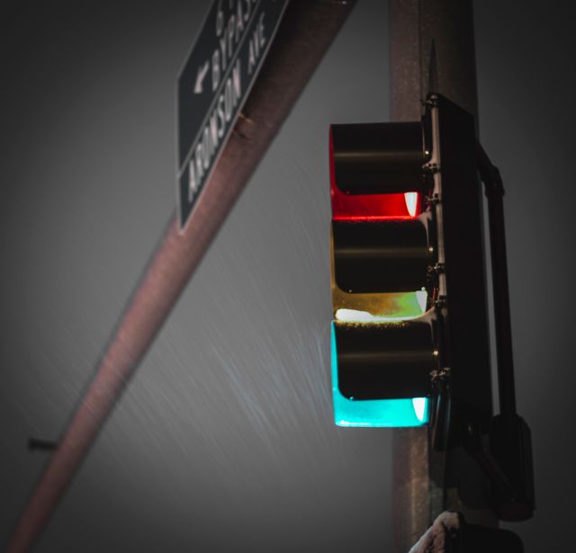 Traffic Light During Snowfall at Night Intersection - Download Free Stock Images Pikwizard.com