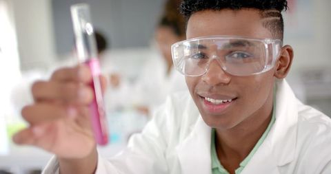 enthusiastic teen scientist experimenting in high school laboratory - Download Free Stock Images Pikwizard.com