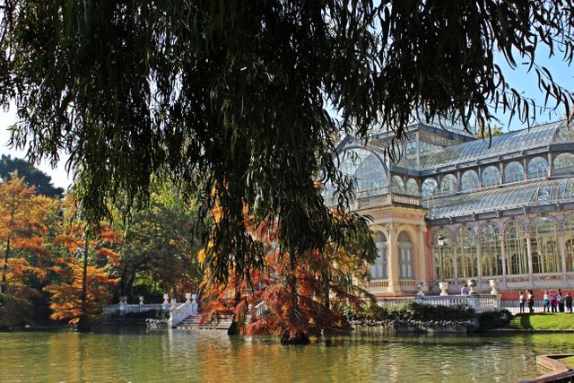 Crystal Palace by Tranquil Lake in Autumnal Park - Download Free Stock Images Pikwizard.com