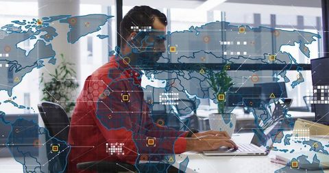 Middle Eastern IT specialist working on global network visualization dashboard
