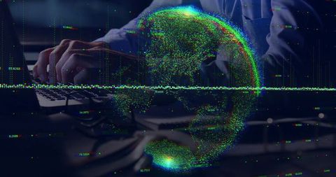 Businessman typing on laptop with futuristic hologram globe overlay