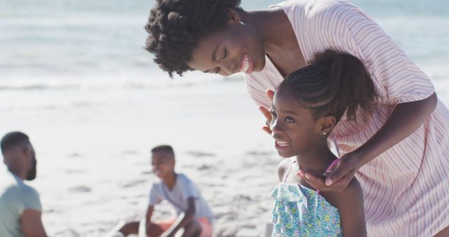 Smiling African American Family Spending Time at Beach - Download Free Stock Images Pikwizard.com